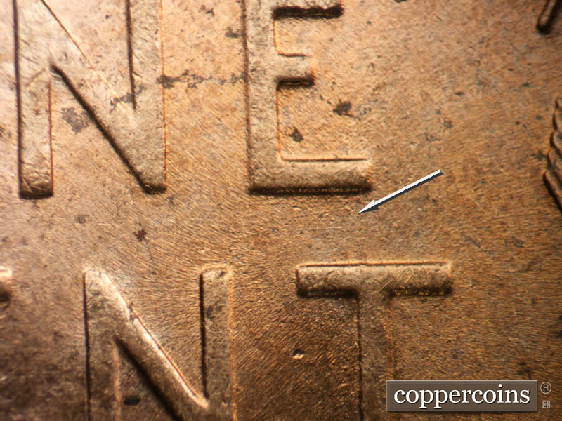Die-stage B marker on 1955D•1DO•011 (1955 Doubled Die Obverse).