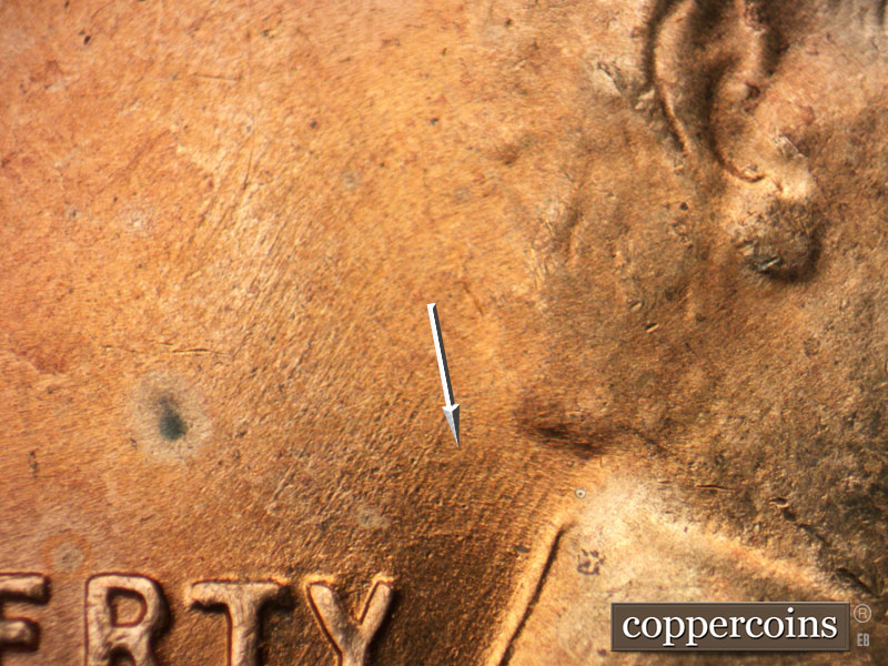 Die-stage B marker on 1955D•1DO•012 (1955 Doubled Die Obverse).