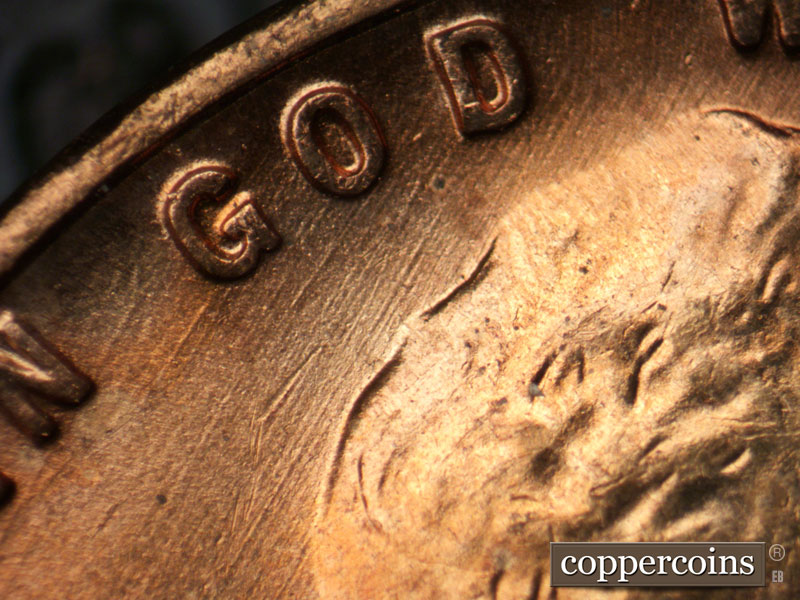 Die-stage B marker on 1955D•1DO•012 (1955 Doubled Die Obverse).