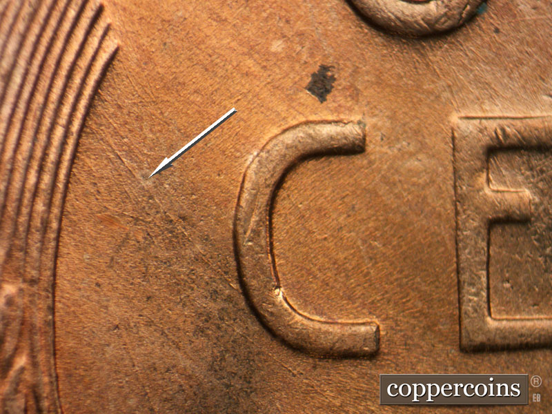 Die-stage B marker on 1955D•1DO•012 (1955 Doubled Die Obverse).