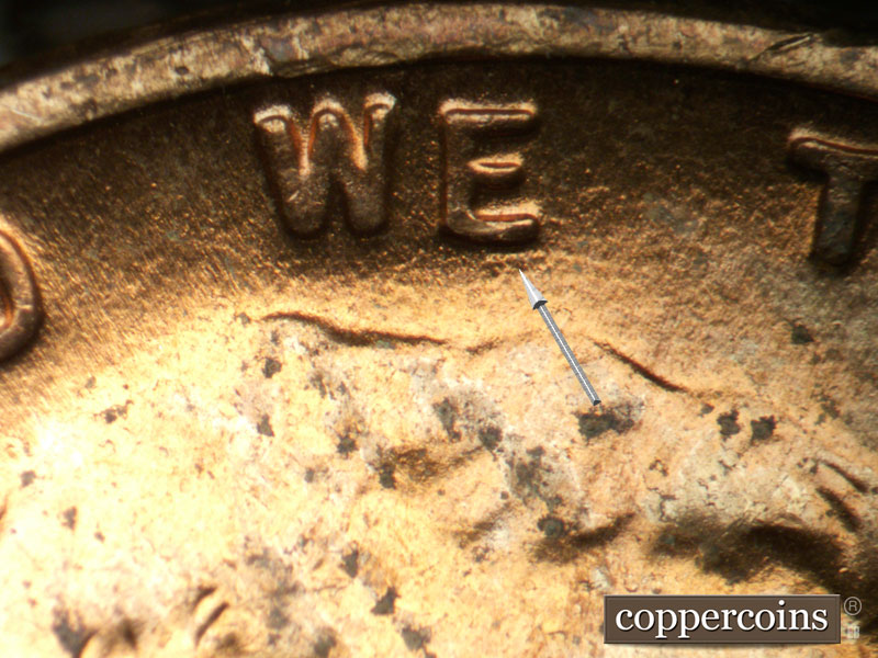Die-stage C marker on 1955D•1DO•013 (1955 Doubled Die Obverse).