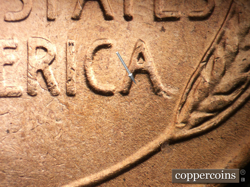 Die-stage B marker on 1955D•1DO•014 (1955 Doubled Die Obverse).