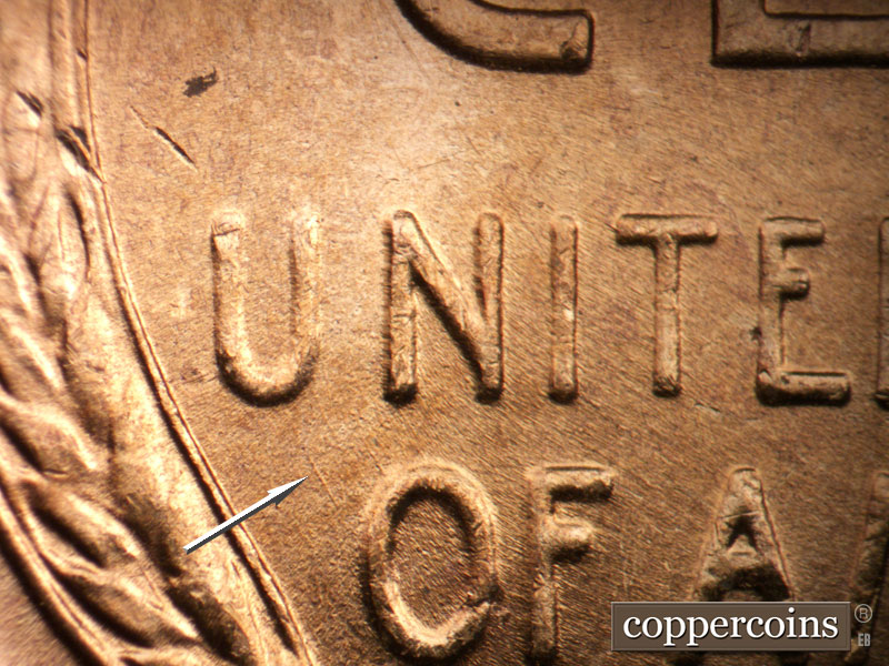 Die-stage B marker on 1955D•1DO•014 (1955 Doubled Die Obverse).