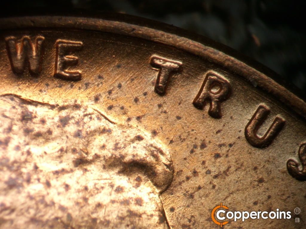 Die-stage B marker on 1955D•1DO•016 showing Extra horizontal bar on first T in TRUST.