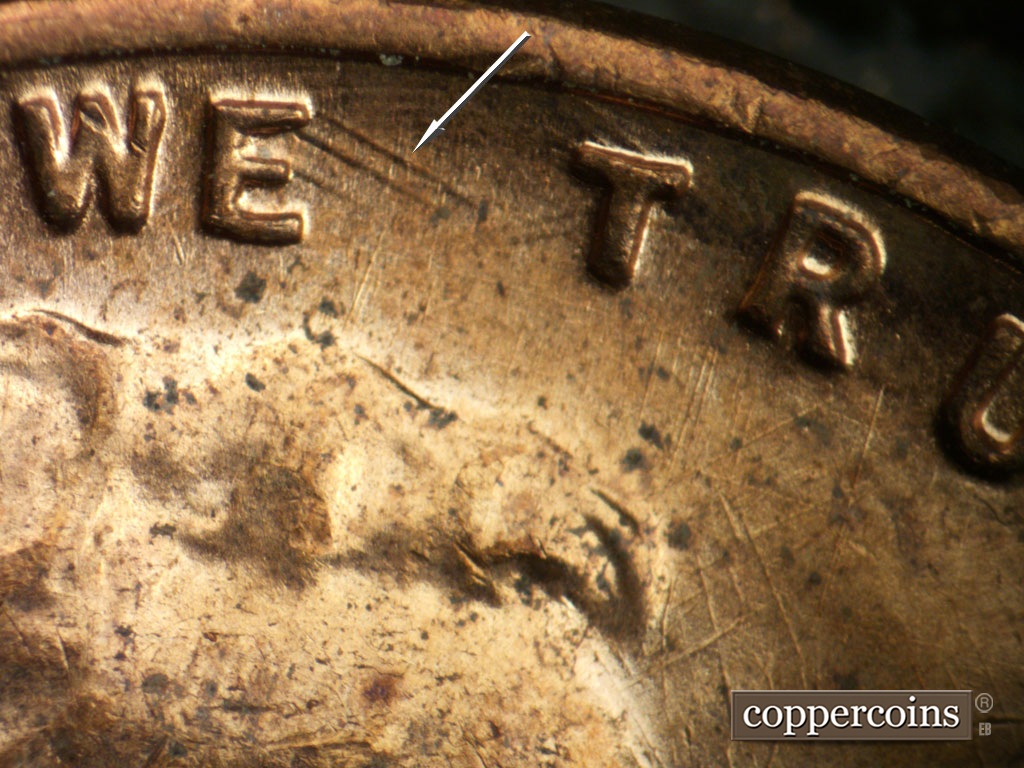 Die-stage B marker on 1955D•1MM•003 showing Heavy SE die gouges from top of E in WE.