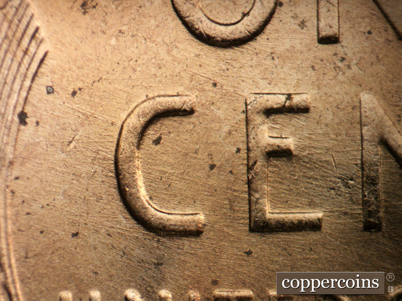Die-stage A marker on 1955D•1MM•017 (1955 Repunched Mint Mark).