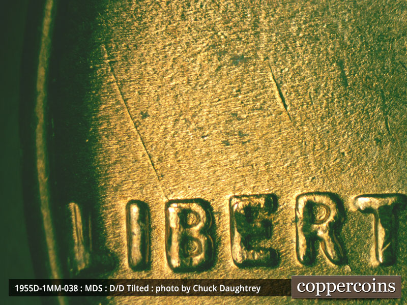 Die-stage B marker on 1955D•1MM•038 (1955 Repunched Mint Mark).