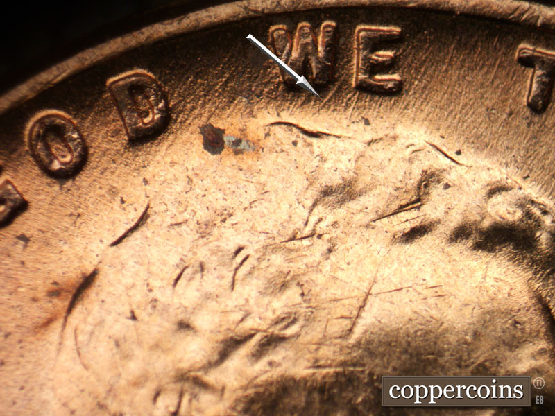Die-stage B marker on 1955D•1MM•042 (1955 Repunched Mint Mark).
