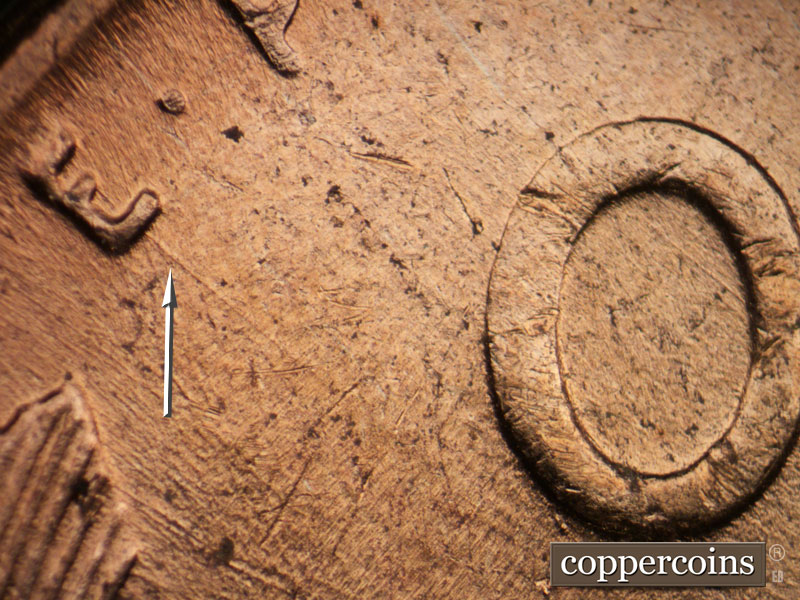 Die-stage B marker on 1955D•1MM•042 (1955 Repunched Mint Mark).