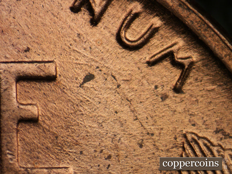 Die-stage B marker on 1955D•1MM•042 (1955 Repunched Mint Mark).