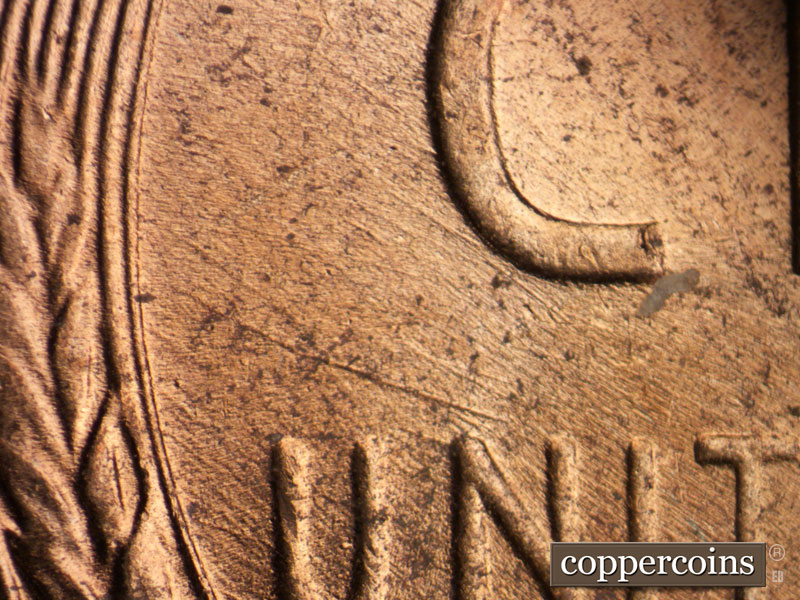 Die-stage B marker on 1955D•1MM•042 (1955 Repunched Mint Mark).
