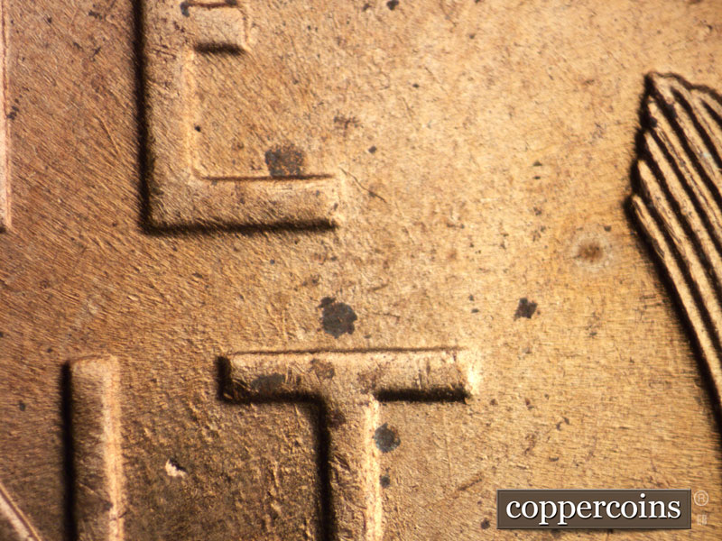 Die-stage B marker on 1955D•1MM•049 (1955 Repunched Mint Mark).