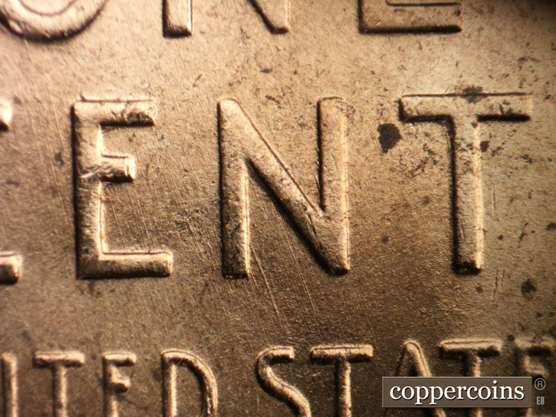 Die-stage B marker on 1955D•1MM•055 (1955 Repunched Mint Mark).
