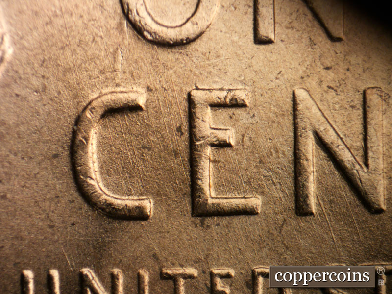 Die-stage B marker on 1955D•1MM•055 (1955 Repunched Mint Mark).