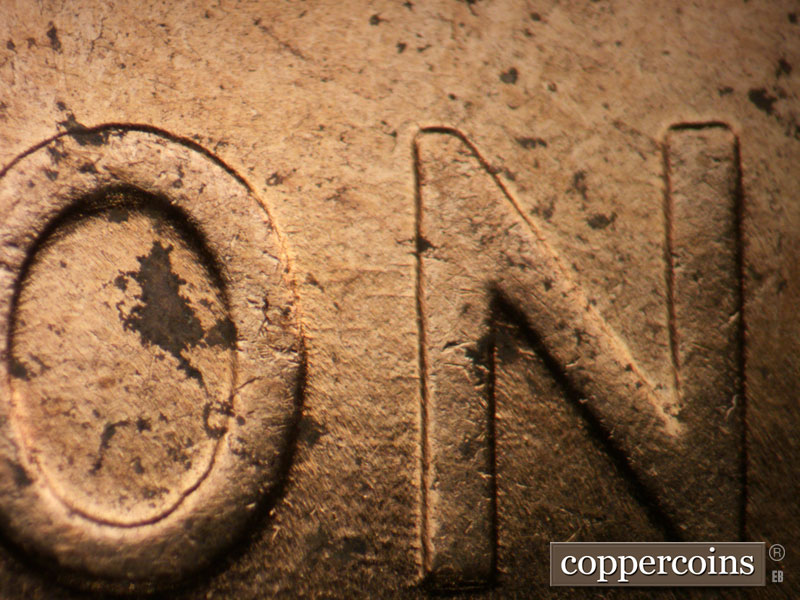 Die-stage B marker on 1955D•1MM•056 (1955 Repunched Mint Mark).