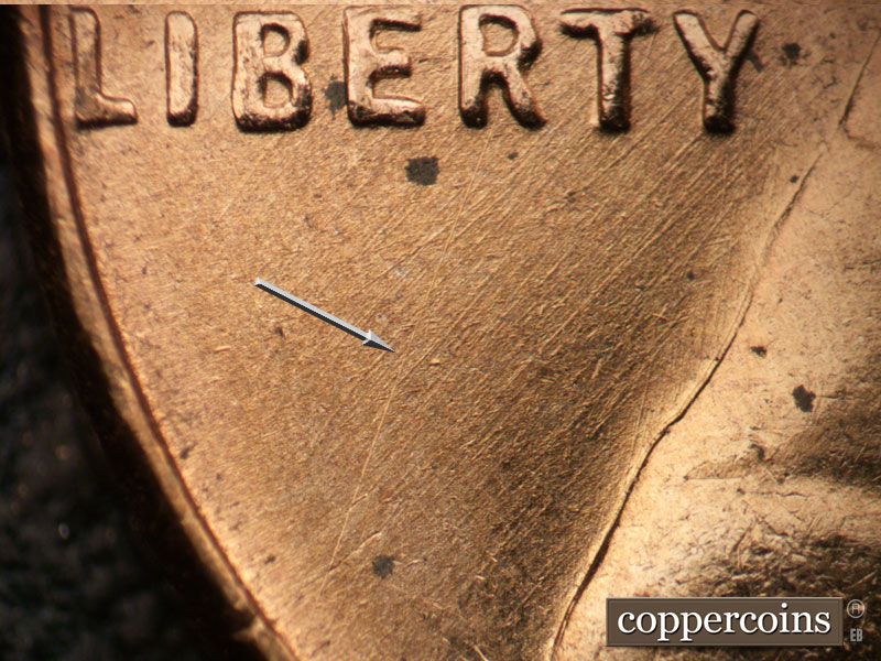Die-stage B marker on 1955D•1MM•057 (1955 Repunched Mint Mark).