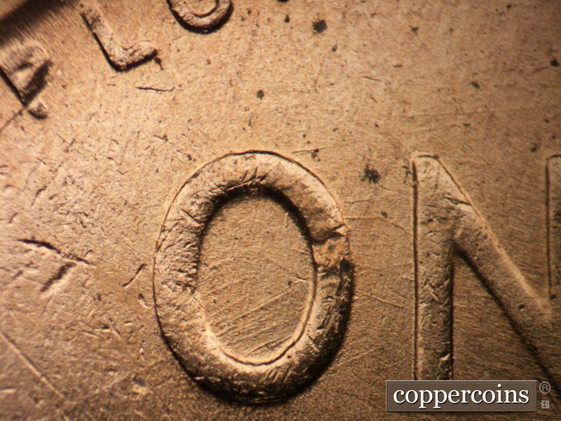 Die-stage B marker on 1955D•1MM•057 (1955 Repunched Mint Mark).