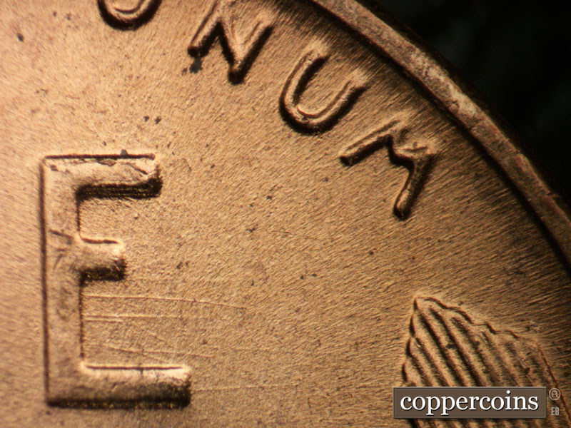 Die-stage B marker on 1955D•1MM•057 (1955 Repunched Mint Mark).
