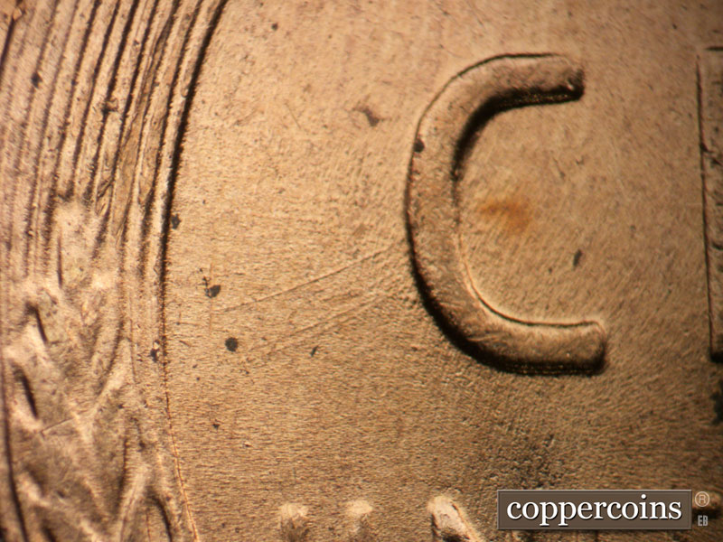 Die-stage B marker on 1955D•1MM•057 (1955 Repunched Mint Mark).