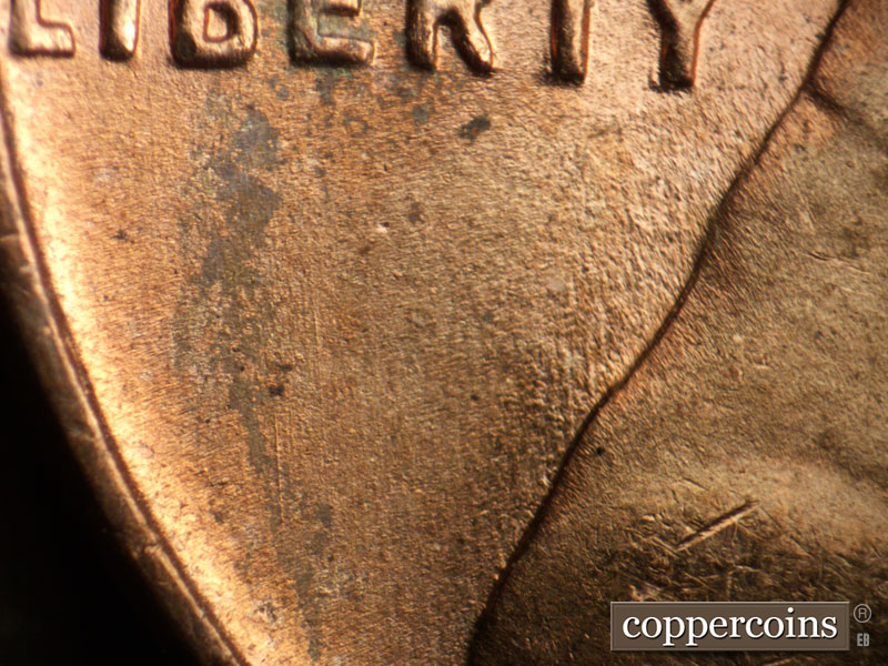 Die-stage B marker on 1955D•1MM•058 (1955 Repunched Mint Mark).