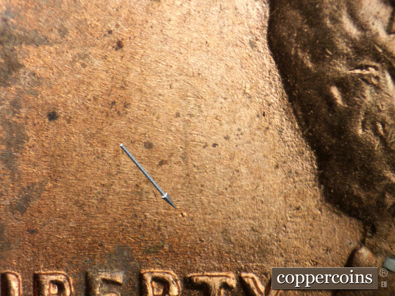 Die-stage B marker on 1955D•1MM•058 (1955 Repunched Mint Mark).