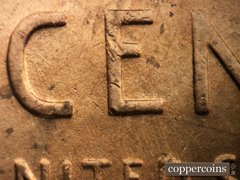 Die-stage B marker on 1955D•1MM•058 (1955 Repunched Mint Mark).