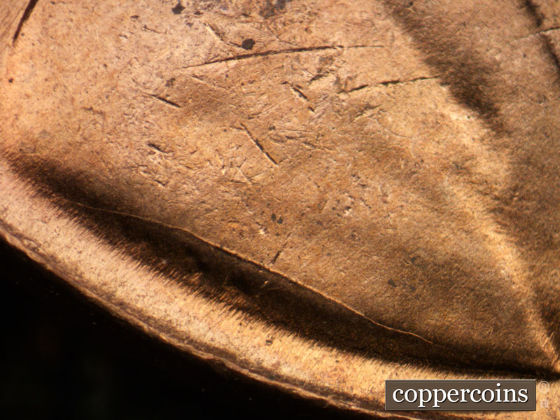 Die-stage B marker on 1955D•1MM•061 (1955 Repunched Mint Mark).