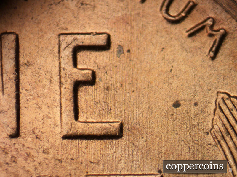 Die-stage B marker on 1955D•1MM•061 (1955 Repunched Mint Mark).