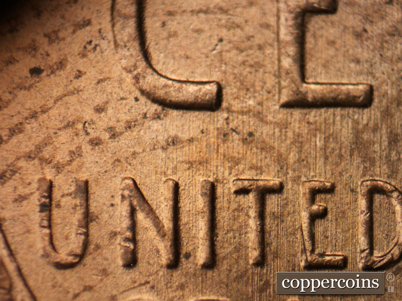 Die-stage B marker on 1955D•1MM•061 (1955 Repunched Mint Mark).