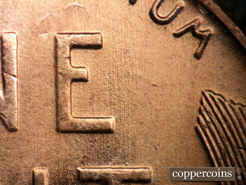 Die-stage B marker on 1955D•1MM•065 (1955 Repunched Mint Mark).