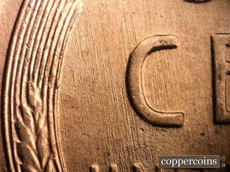 Die-stage B marker on 1955D•1MM•065 (1955 Repunched Mint Mark).