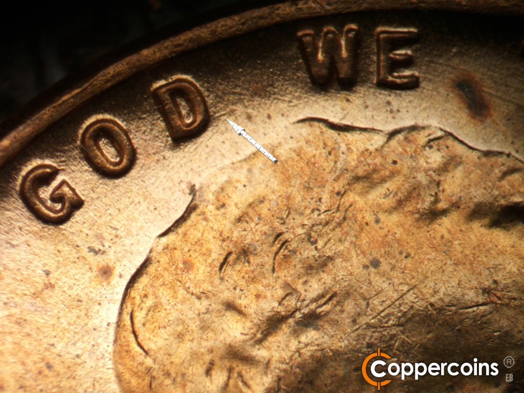Die-stage B marker on 1955D•1MM•072 showing Smal die gouge from D in GOD.