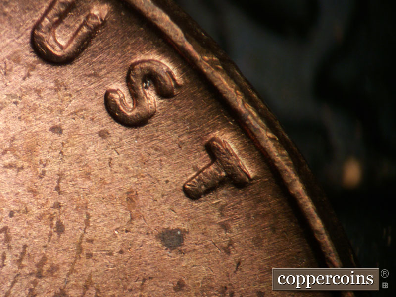 Die-stage B marker on 1955P•1DO•002 (1955 Doubled Die Obverse).