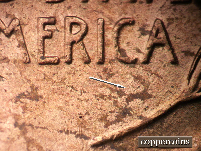 Die-stage B marker on 1955P•1DO•002 (1955 Doubled Die Obverse).