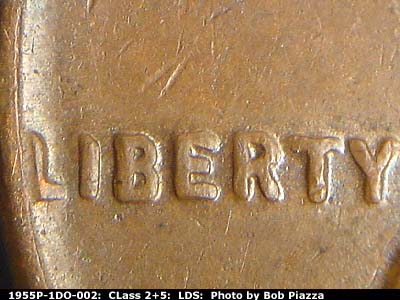 Die-stage C marker on 1955P•1DO•002 (1955 Doubled Die Obverse).