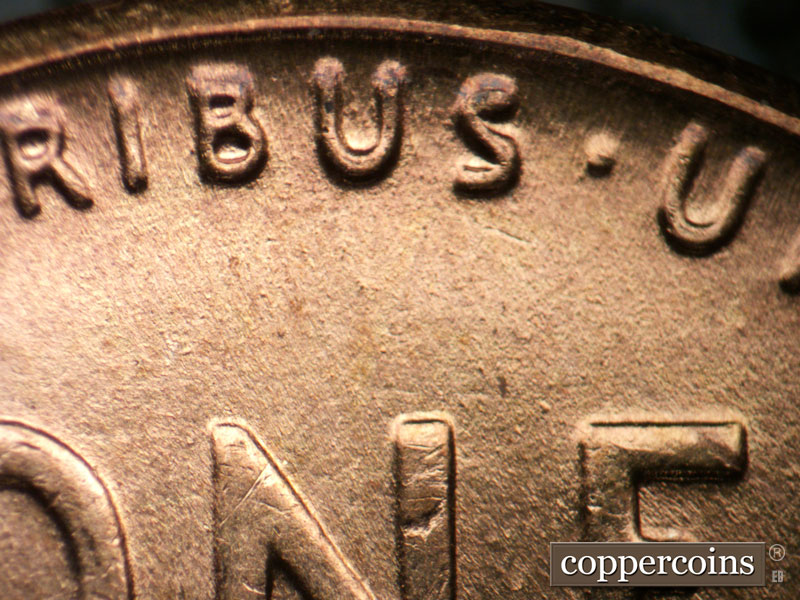 Die-stage B marker on 1955P•1DO•004 (1955 Doubled Die Obverse).