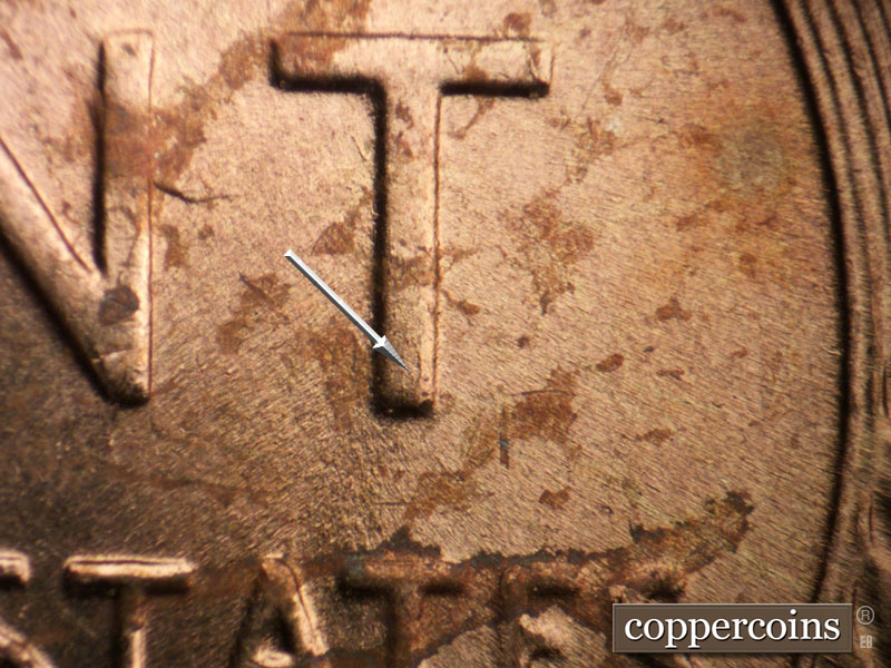 Die-stage B marker on 1955P•1DO•004 (1955 Doubled Die Obverse).