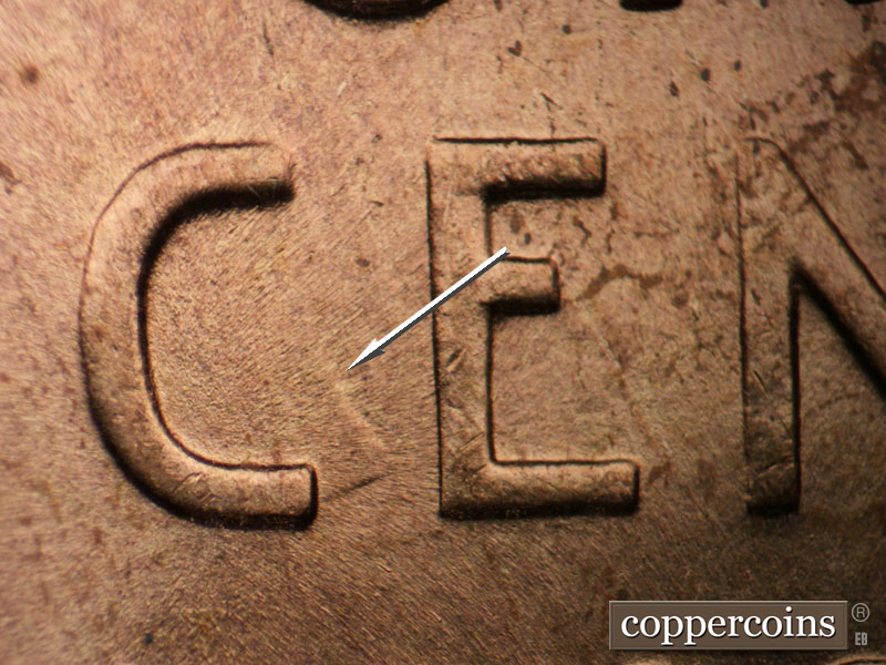Die-stage B marker on 1955P•1DO•004 (1955 Doubled Die Obverse).