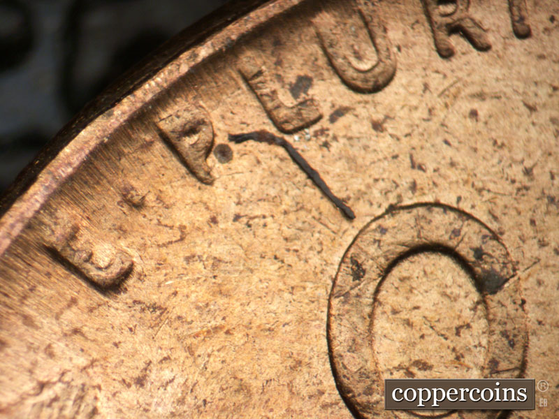 Die-stage C marker on 1955P•1DO•004 (1955 Doubled Die Obverse).