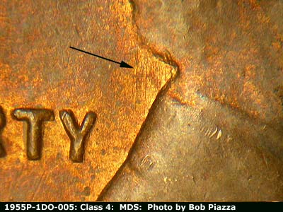 Die-stage B marker on 1955P•1DO•005 (1955 Doubled Die Obverse).