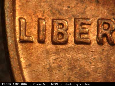 Die-stage B marker on 1955P•1DO•006 (1955 Doubled Die Obverse).