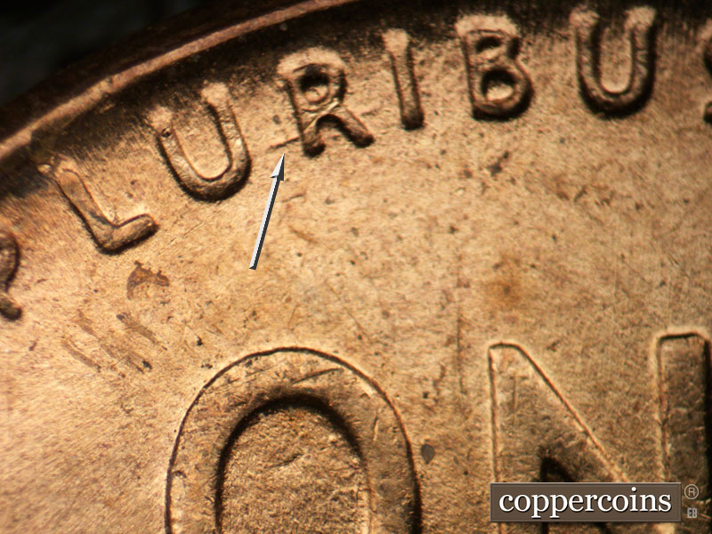 Die-stage B marker on 1955P•1DO•010 (1955 Doubled Die Obverse).