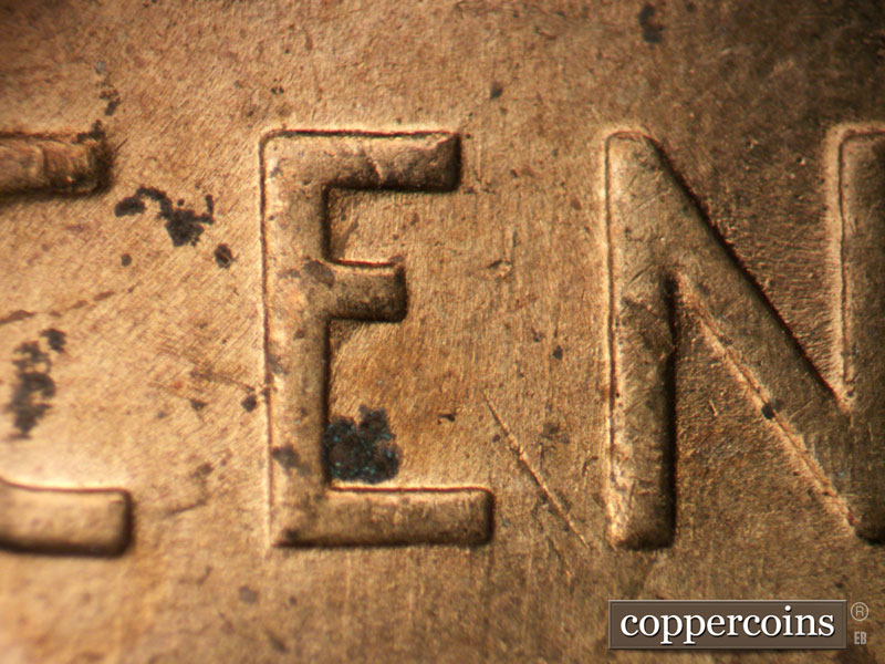 Die-stage B marker on 1955P•1DO•010 (1955 Doubled Die Obverse).