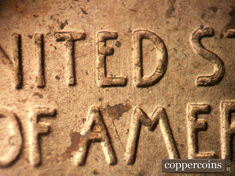 Die-stage B marker on 1955P•1DO•010 (1955 Doubled Die Obverse).
