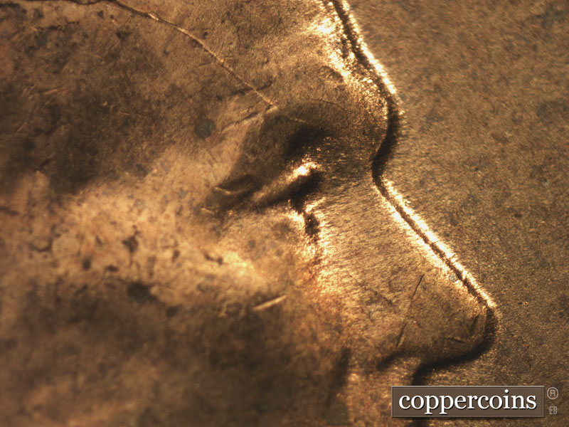 Die-stage C marker on 1955P•1DO•010 (1955 Doubled Die Obverse).