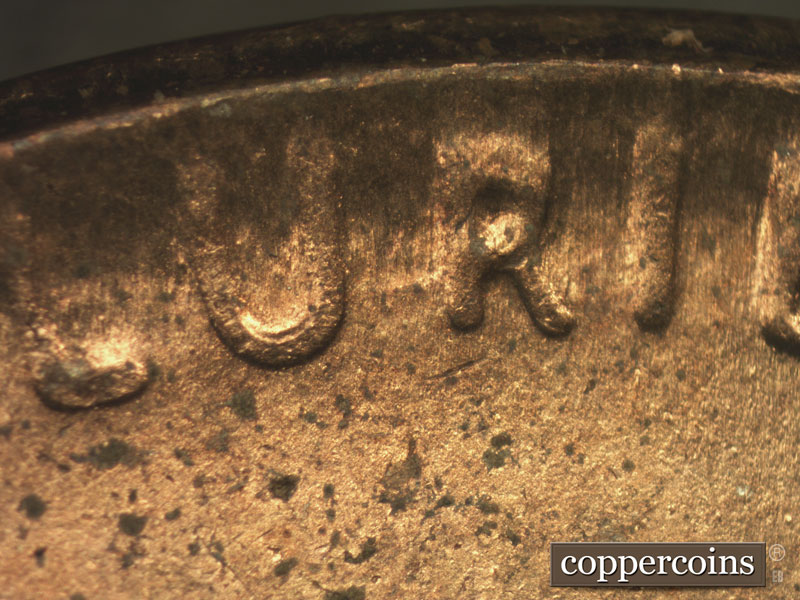 Die-stage C marker on 1955P•1DO•010 (1955 Doubled Die Obverse).