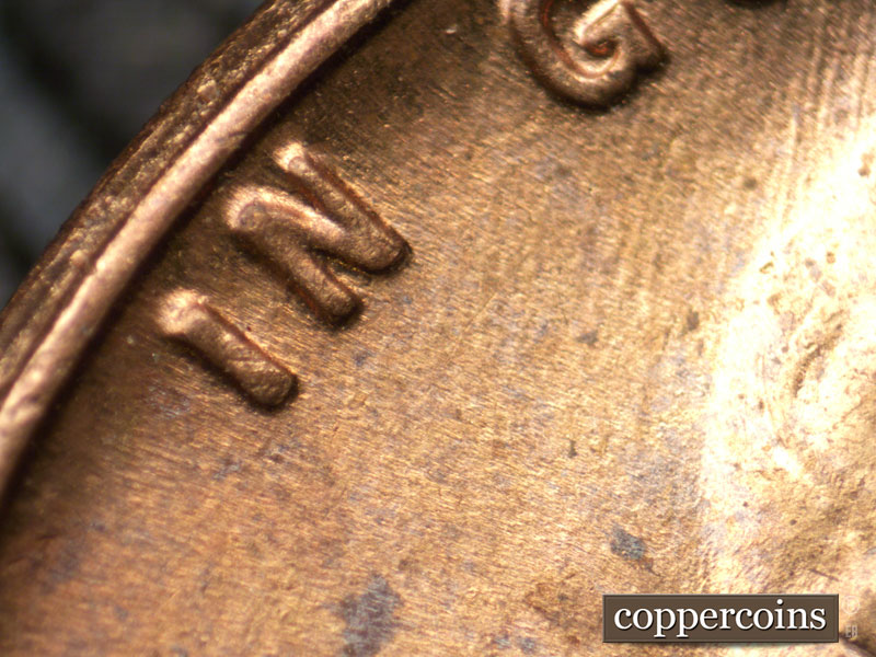 Die-stage B marker on 1955P•1DO•011 (1955 Doubled Die Obverse).