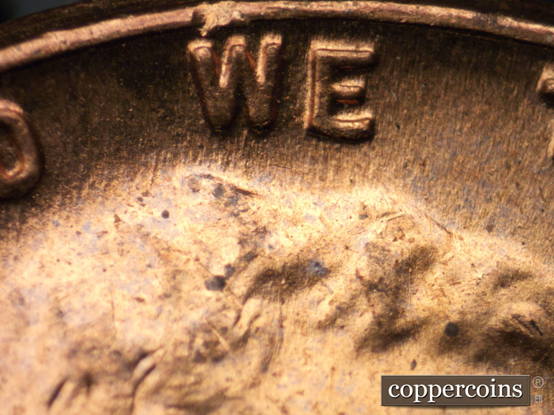 Die-stage B marker on 1955P•1DO•011 (1955 Doubled Die Obverse).