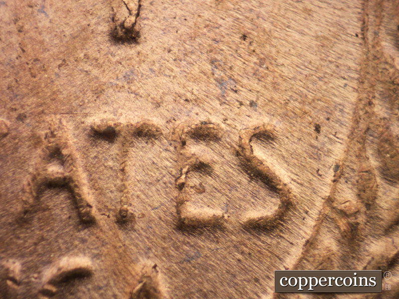 Die-stage B marker on 1955P•1DO•011 (1955 Doubled Die Obverse).