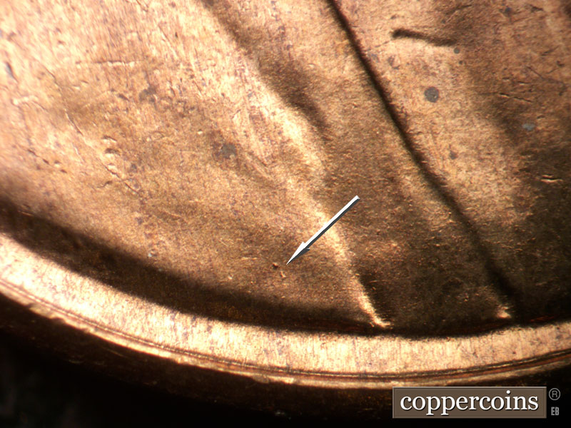 Die-stage A marker on 1955P•1DO•012 (1955 Doubled Die Obverse).